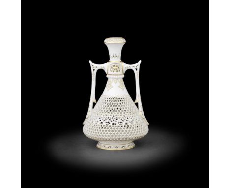 A fine Royal Worcester reticulated vase by George Owen, dated 1918Of Persian shape, the tapering body intricately pierced wit