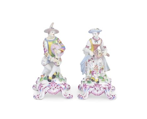 A pair of Bow figures of Harlequin and Columbine, circa 1765-70 After Meissen models, Harlequin playing the pipes and Columbi