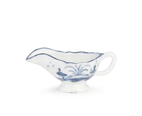 A Caughley toy sauceboat, circa 1785-88Of oval form with a delicate loop handle, painted in blue with the 'Island' pattern, a