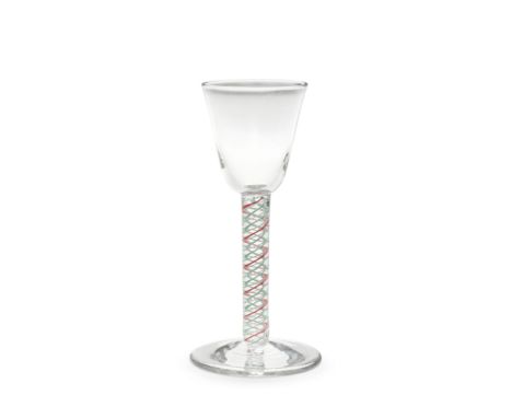 A good green and red colour twist wine glass, circa 1765The round funnel bowl on a stem containing three central heavy opaque