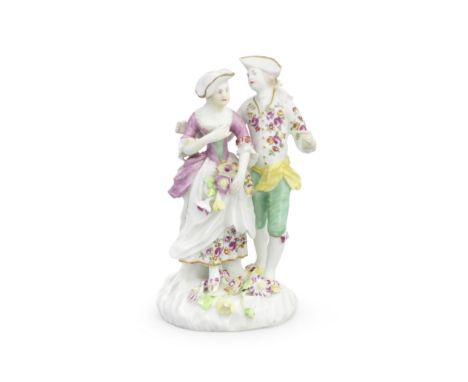 A Derby group of Lovers, circa 1760The lady and gentleman standing arm in arm, flowers gathered in her apron, his floral jack