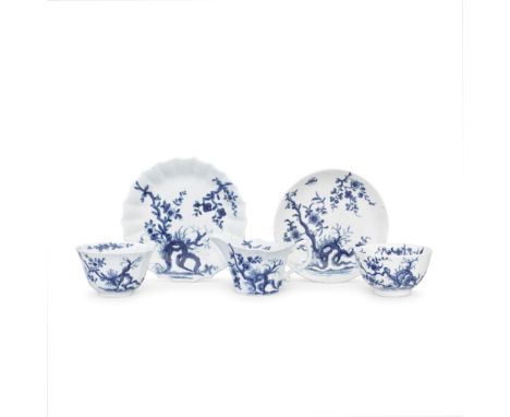 A Worcester  creamboat and two teabowls and saucers, circa 1755-70Painted in blue with the 'Prunus Root' pattern (I.D.27), th