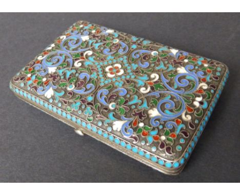 A late 19thC .84 standard Russian cloisonne silver cigarette case, having overall decoration of coloured arabesque floral scr