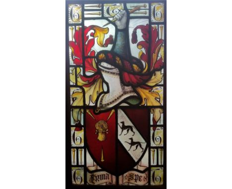 A Victorian leaded light stained glass panel in oak frame, decorated with heraldic crest – 'Firma Spe', 28.5” x 16” overall -
