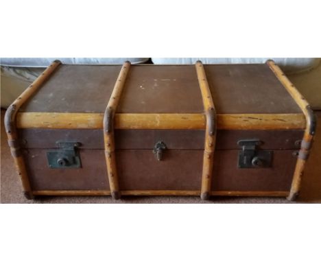 A canvas covered wooden cabin trunk