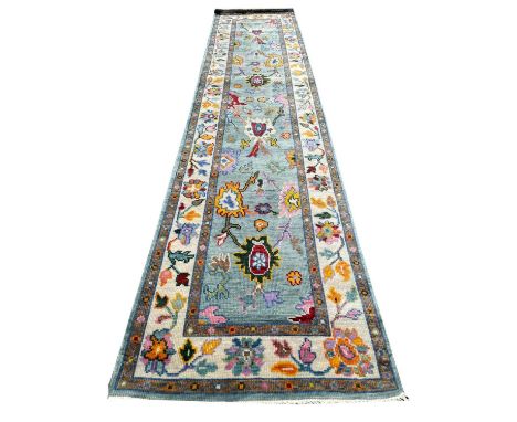 FINE CONTEMPORARY OUSHAK RUNNER, 335cm x 77cm. 