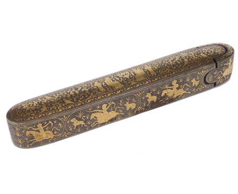 ‡ A QAJAR IRON PENBOX, PERSIA, 19TH CENTURYof long oval form, the gold damascened decoration, with drinking, foliate and hunt