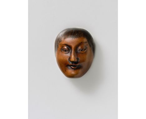 A JAPANESE MASK NETSUKE OF SHOJO, BY KYOTO MASANAO, CIRCA 1780boxwood with incised and black lacquered hair and brows, signed