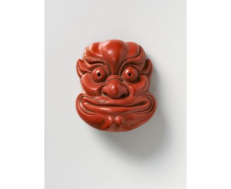 A JAPANESE MASK NETSUKE OF SARU-BESHIMI, BY SÔSHIN, 20TH CENTURYtsuishu lacquer, signed ‘Sôshin to’4.7cm highA similar mask i