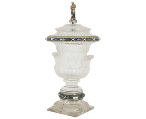 A SILVER-GILT MOUNTED ROCK CRYSTAL VASE AND COVER, AUSTRO-HUNGARIAN, CIRCA 1900the two-handled urn-shaped body carved with bo