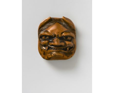 A JAPANESE MASK NETSUKE OF ONI WITH OKAME BEHIND, LATE 18TH CENTURYboxwood, unsigned4.5cm highThe subject alludes to the annu