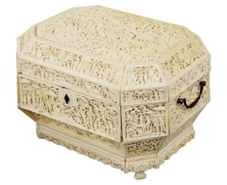 ~A CHINESE IVORY WORK BOX, CANTON, MID 19TH CENTURYof cut-cornered rectangular bowed outline, with metal drop loop handles an