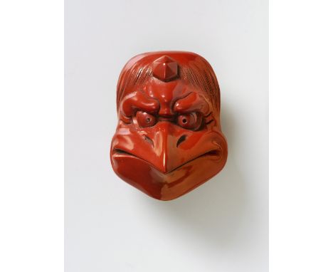 A JAPANESE MASK NETSUKE OF KARASU-TENGU, BY SOMIN, 19TH CENTURYtsuishu lacquer, signed ‘Somin to’5.2cm high Peter E. Müller J