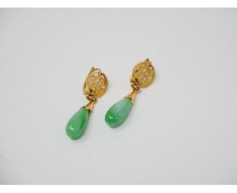 JADE NECKLACEdesigned as a row of knotted beads measuring between 5mm-10mm approximately, length approximately 710mm; togethe