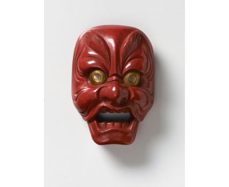 A JAPANESE MASK NETSUKE OF GENJORAKU, BY SOSAI, 20TH CENTURYtsuishu lacquer, the eye pupils inlaid in shell, signed ‘Sosai’5.