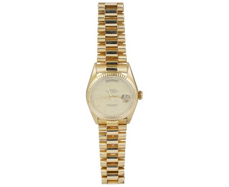 ROLEX, OYSTER PERPETUAL DAY-DATE, REF. 18038: A GENTLEMAN’S EIGHTEEN CARAT GOLD BRACELET WATCH, CIRCA 1987No.9545722, cal.305