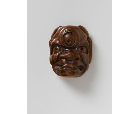 A JAPANESE MASK NETSUKE OF BAKEMONO, BY GARAKUSAI, 19TH CENTURYwood, signed ‘Garakusai zo’4.4cm high Peter E. Müller Japanese