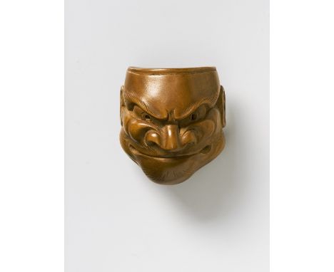 A JAPANESE MASK NETSUKE OF BESHIMI, 19TH CENTURYpale boxwood, unsigned4.1cm high Peter E. Müller Japanese Mask Collection No.