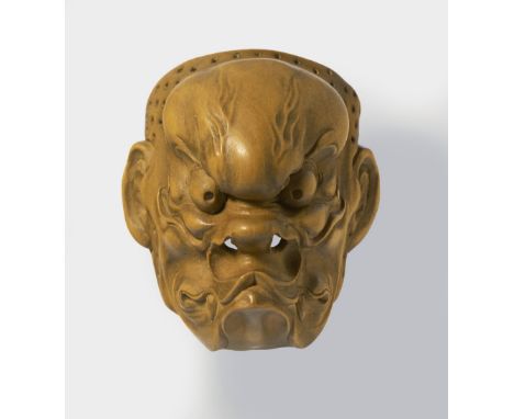 A JAPANESE MASK NETSUKE OF A GURNING GHOUL, BY KOKEISAI SANSHO, EARLY 20TH CENTURYpale boxwood, signed with kaoō3.9cm high Pe