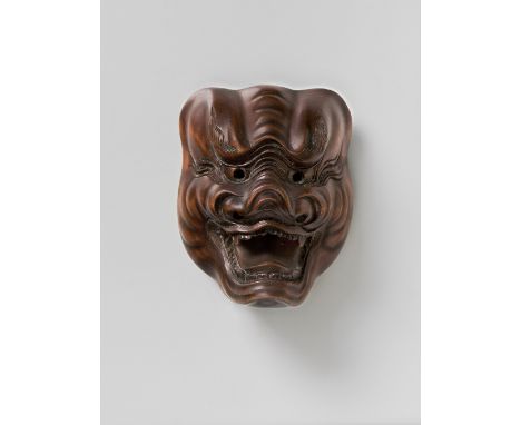 A JAPANESE MASK NETSUKE OF SHISHIGUCHI, ATTRIBUTED TO HOZAN, EARLY 20TH CENTURYlightly stained boxwood, replaced signature ta