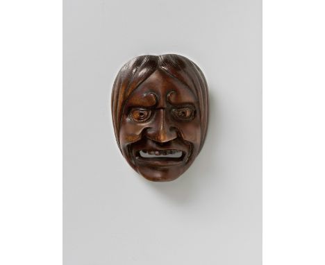 A JAPANESE MASK NETSUKE OF A FEMALE DEMON, BY GYOKUMITSU, 19TH CENTURYwood, signed ‘Gyokumitsu’4.6cm high Peter E. Müller Jap