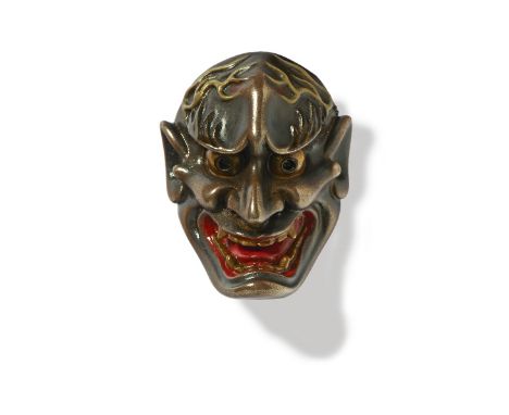 A JAPANESE MASK NETSUKE OF SHIKAMI, EARLY 20TH CENTURYlacquered wood, unsigned3.6cm high Peter E. Müller Japanese Mask Collec