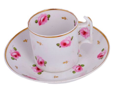 A DERBY COFFEE CAN AND TWO SAUCERS, CIRCA 1815painted with pink roses, red painted mark; together with a pair of Minton coffe
