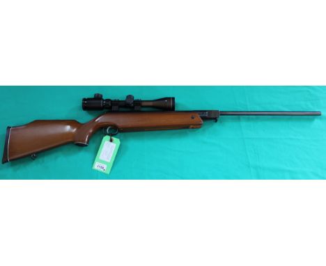A 'Feinwerkbau' Sport 124 .177 cal break barrel air rifle, S/No.29197 with a Bushnell 3-9x40E scope and slip, as a post 1939 