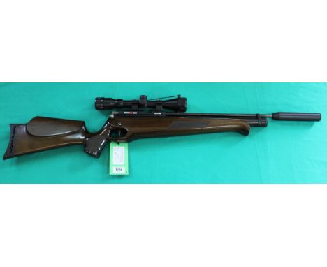 A Brocock .22 cal hunter P.C.P. air rifle complete with pump, sound moderator and slip, also included is a Hawke Eclipse 3-9x