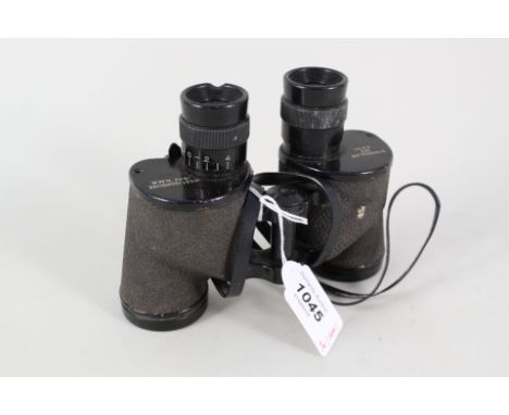 A pair of U.S.A. M3 binoculars dated 1942, with various vintage flags