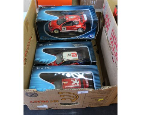 Boxed Solido 1:18 scale model rally cars Citroen Xsara, Citron Xsara T4 WRC (2) and a Peugeot 206 WRC