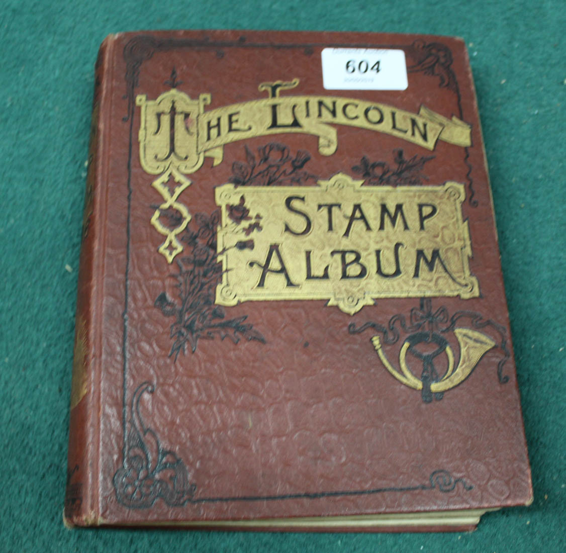A Lincoln stamp album containing older stamps