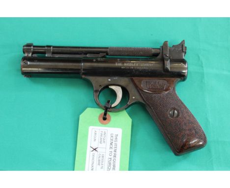 A Webley 'Senior' .177 air pistol (Batch D) and stamped 1635 with brown grips (1958-1964), as a post 1939 air weapon the rest