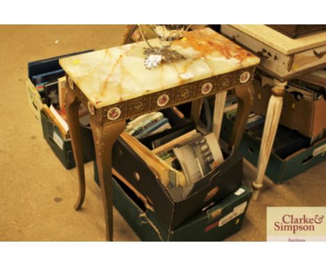 A gilt wood console table with green onyx top