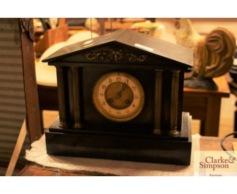 A Victorian marble cased mantel clock