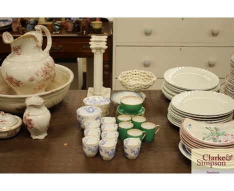 Eight Royal Worcester coffee cups and saucers; and two matching bowl; a pair of white glazed Corinthian column candlesticks e