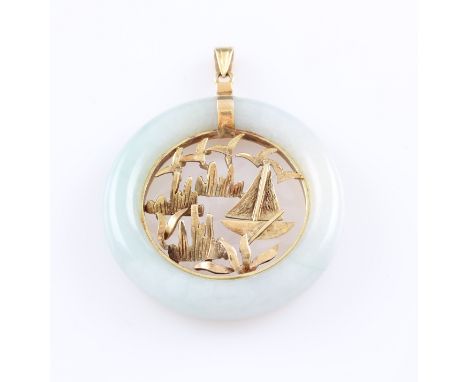 A circular jade pendant, consisting of a ring of carved jade mounted with central open metalwork boat and bird scene, loop st
