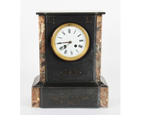 A black slate and marble mantel clock with ornate decorations to body, the white enamel dial having black Roman numeral hourl