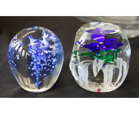 A Strathearn glass lamp work paperweight with blue flower with latticing canes together with a studio glass paperweight signe