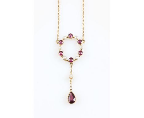 A lot to include an Edwardian 15ct yellow gold garnet and seed pearl necklet, of halo design set with alternating garnets and