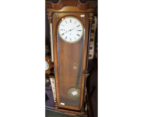 A rosewood cased vienna wall clock with white enamel dial with black Roman hourly markers, with three weight movement with pe