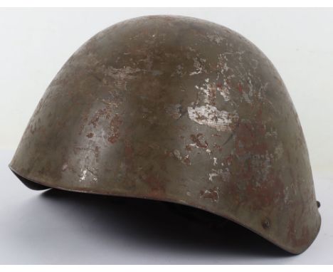 Greek Military Steel Combat Helmet, good example retaining nearly all of its original field green combat paint finish. Interi