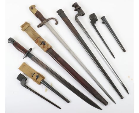 British 1907 Bayonet, with two piece wooden grips, complete with its original scabbard. Various stampings. Generally good con
