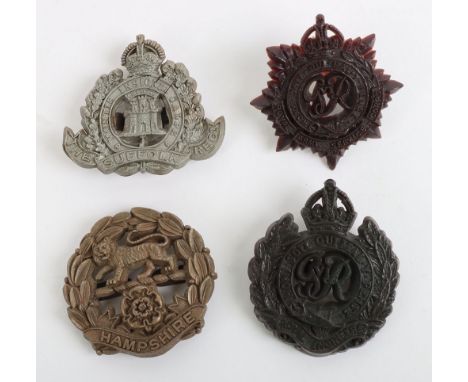 4x WW2 War Economy Cap Badges, produced in plastic, for the Suffolk Regiment, Hampshire regiment, Roya Engineers and Royal Ar