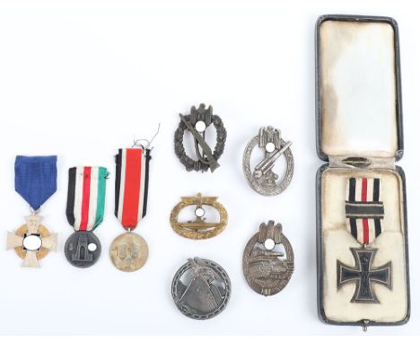 Grouping of German Awards, including U-Boat war badge, Panzer Assault badge in silver, Infantry assault badge, Army Flak badg