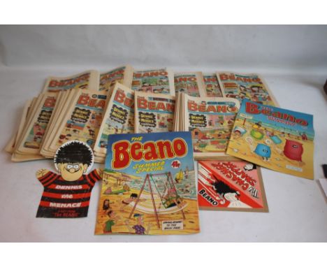 BEANO COMICS WITH TWO FREE GIFTS, approx. 100 1980s Beano comics with two Summer Specials and a 'Gnasher Snapper' and a 'Denn