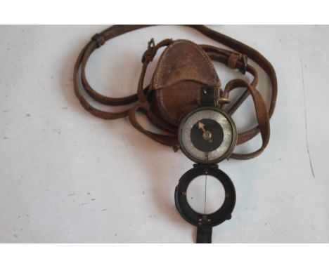 A WWI MARCHING COMPASS, DATED 1918 in fitted leather case