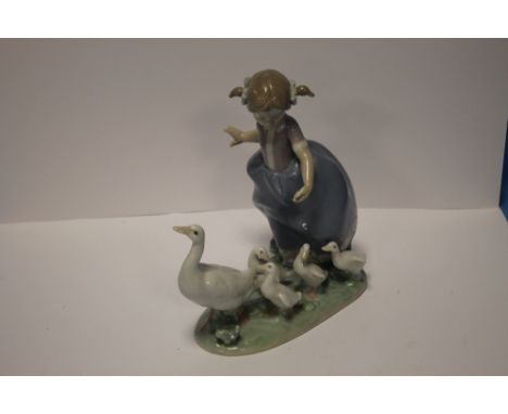 A LLADRO FIGURE GROUP of a girl and geese