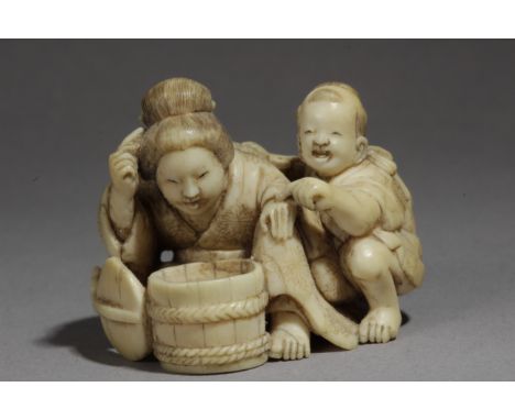 A Japanese netsuke from Edo period circa 1825-1850. Signed Ono Ryoko. In carved ivory portraying a group of characters compos