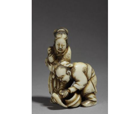 A mid 19th century Japanese netsuke. Signed Tomochika. In carved ivory portraying a family. The father is doing the washing a